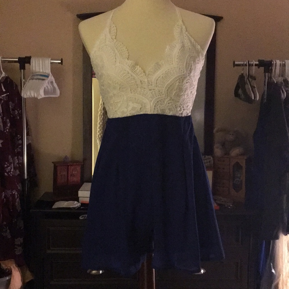 Romper; never worn. Size small.